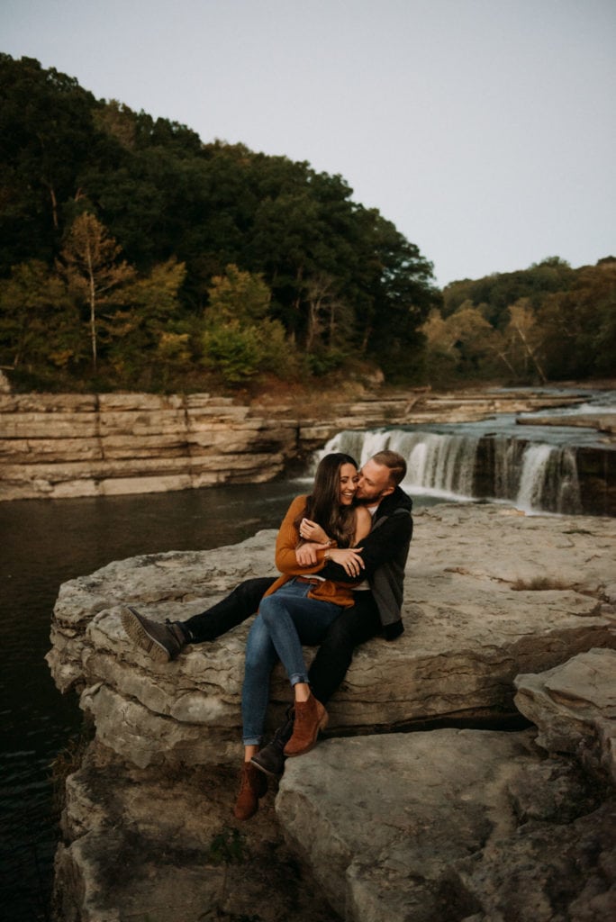 couple by a waterfall
