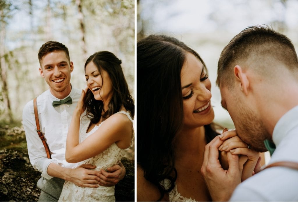 A bride and groom are leaning against a fallen tree and laughing in the forest in Bloomington, Indiana at the Wilds Venue near Brown County State Park.