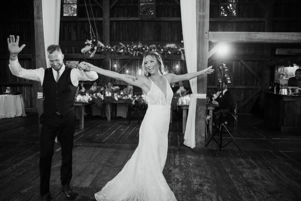 Bride and groom dancing to their choreographed first dance at their wedding reception 