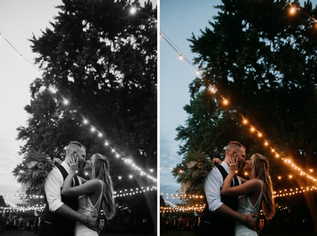 Bride and groom looking at each other underneath string lights at Mustard Seed Gardens