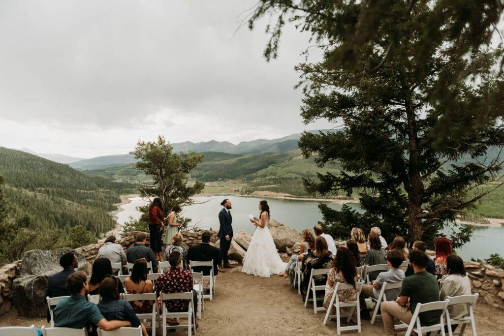 An outdoor micro wedding ceremony takes place at Sapphire Point near Breckenridge colorado