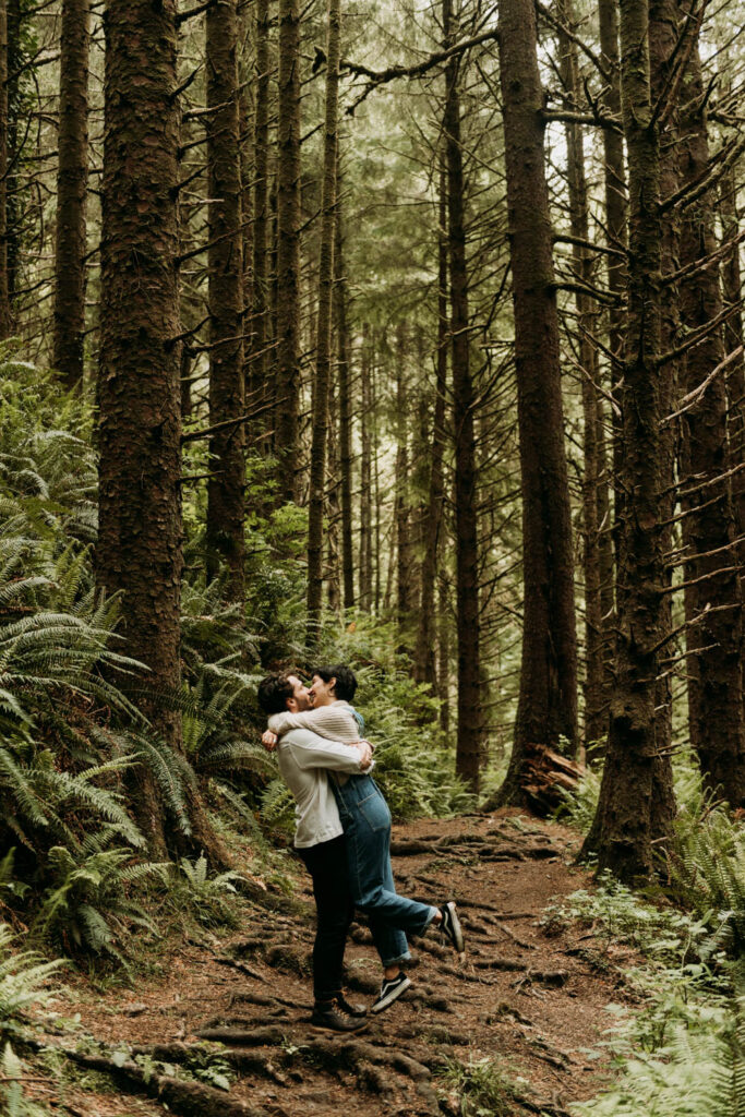 Adventurous couples session in an Oregon forest at ecola state park