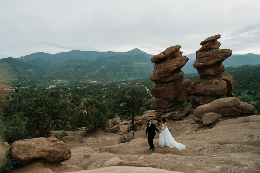 A couple hiking at Garden of the Gods during their Colorado Springs elopement