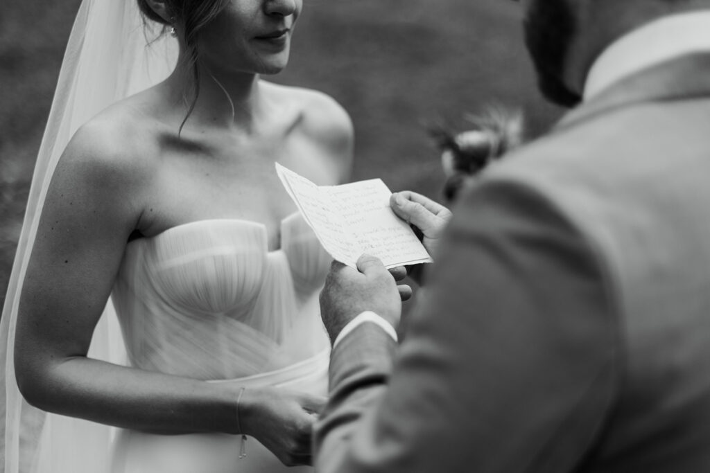 A couple shares their vows during their ceremony at their fall hiking elopement in the San Juan Mountains of Colorado