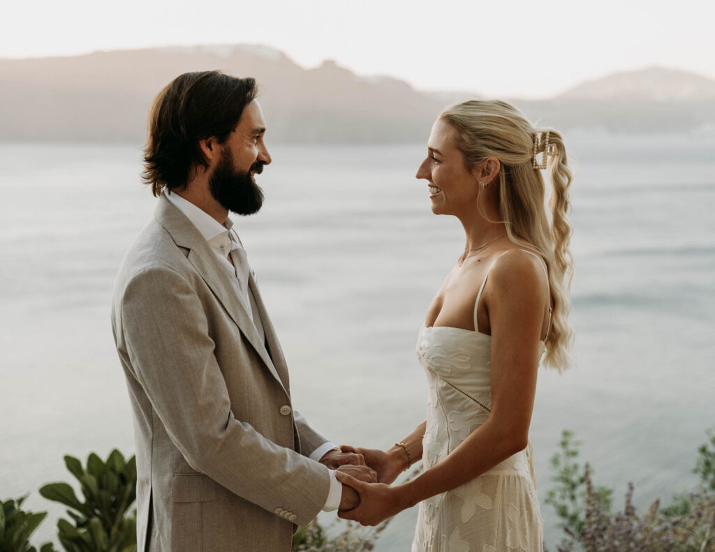 Emotional vows during a magical santorini elopement