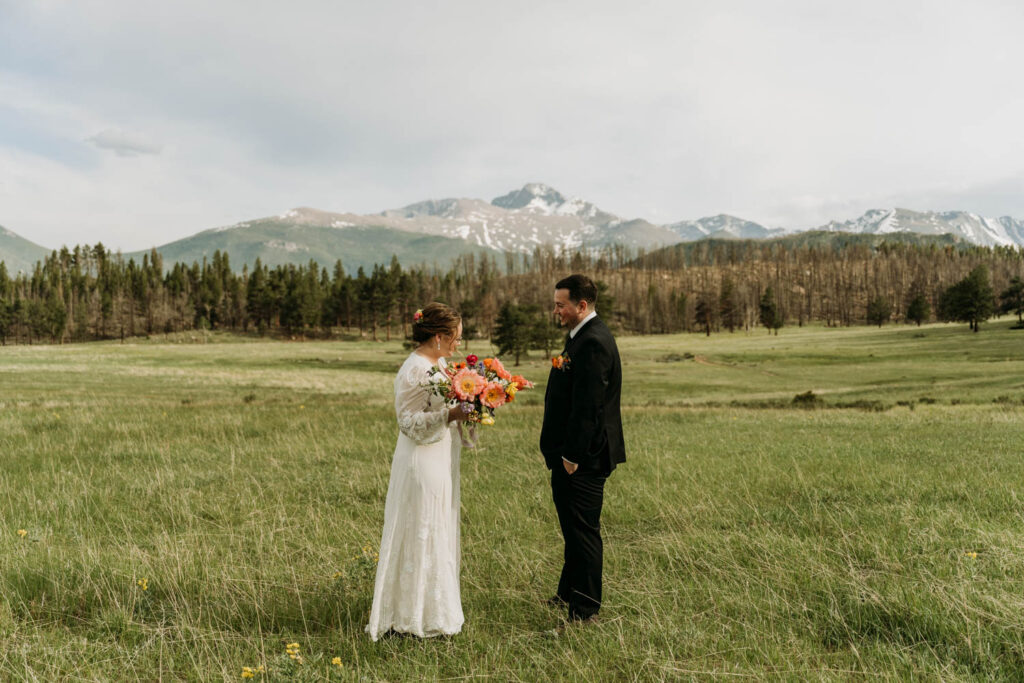 at Upper beaver meadows, a couple shares their vows during their rocky mountain elopement