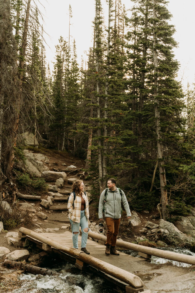 A couple hikes up to Emerald lake during their rocky mountain elopement

