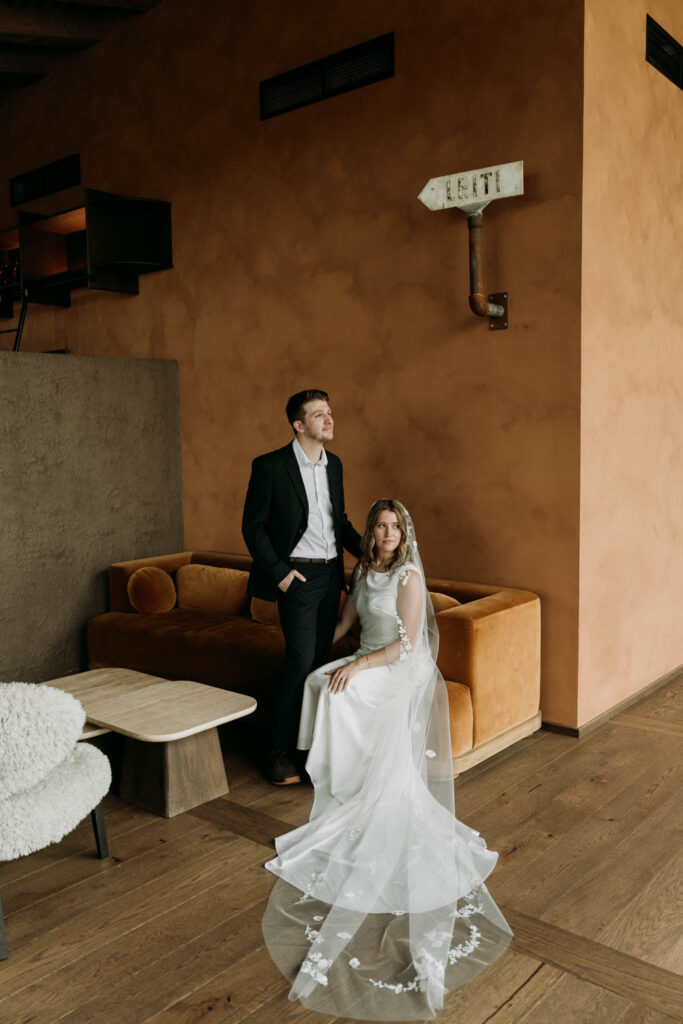 A formal portrait of a wedding couple at Hotel Jokulsarlon before they set out for their Stokksnes elopement