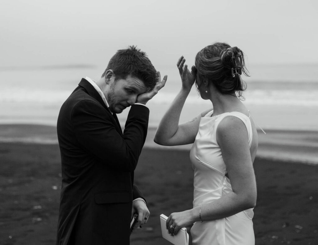 a couple crying during their Stokksnes elopement ceremony